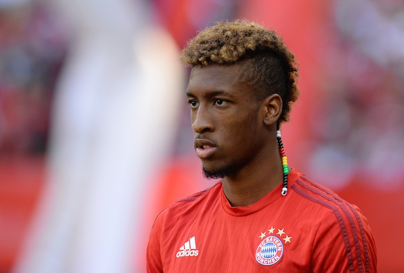 Bayern Munich's new French forward Kingsley Coman is pictured prior to the start of the German first division Bundesliga football match FC Bayern Munich v FC Augsburg, in Munich, on September 12, 2015. AFP PHOTO /CHRISTOF STACHE RESTRICTIONS: DURING MATCH TIME: DFL RULES TO LIMIT THE ONLINE USAGE TO 15 PICTURES PER MATCH AND FORBID IMAGE SEQUENCES TO SIMULATE VIDEO. == RESTRICTED TO EDITORIAL USE == FOR FURTHER QUERIES PLEASE CONTACT DFL DIRECTLY AT + 49 69 650050. (Photo credit should read CHRISTOF STACHE/AFP/Getty Images)